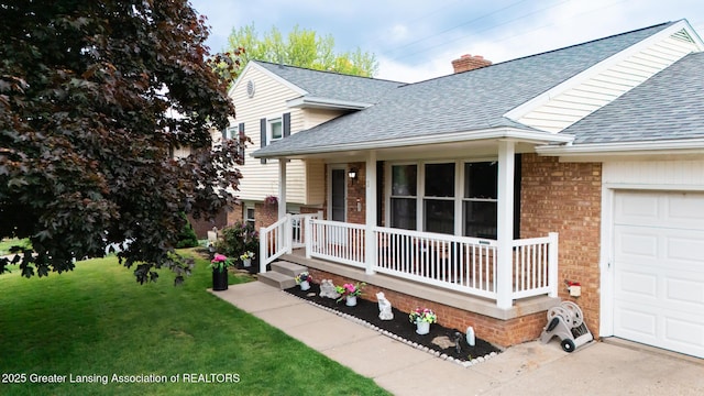 515 Chanticleer Trl, Lansing, MI 48917 - view of front of house featuring covered porch, a shingled roof, brick siding, and a front yard