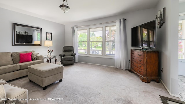 515 Chanticleer Trl, Lansing, MI 48917 - living area featuring carpet floors and baseboards