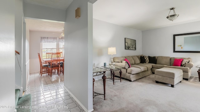 515 Chanticleer Trl, Lansing, MI 48917 - living room featuring a ceiling fan and stairway