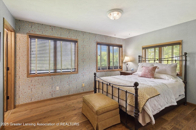 12560 Eaton Rapids Rd, Springport, MI 49284 - bedroom featuring wood-type flooring and baseboards