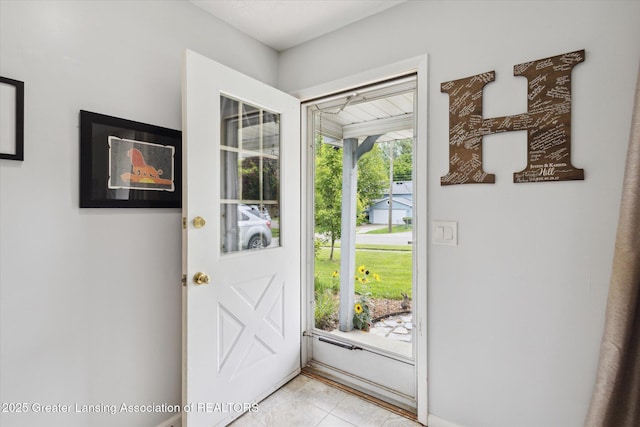 530 S Dibble Blvd, Lansing, MI 48917 - foyer entrance with light tile patterned floors