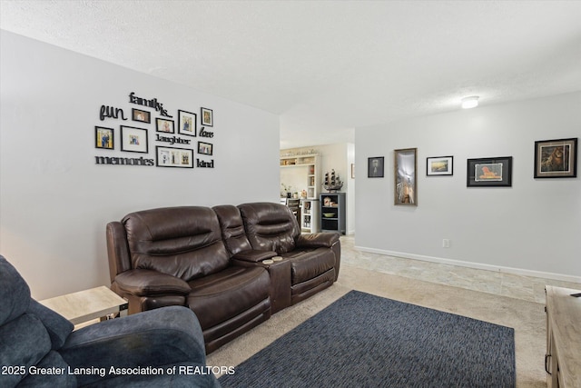 530 S Dibble Blvd, Lansing, MI 48917 - carpeted living room with a textured ceiling