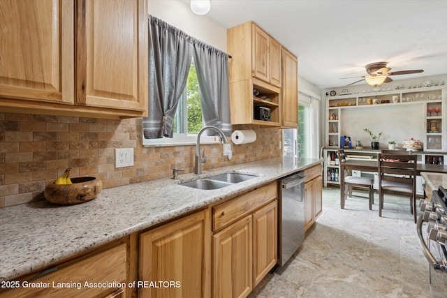 530 S Dibble Blvd, Lansing, MI 48917 - kitchen with a sink, stainless steel dishwasher, healthy amount of natural light, and tasteful backsplash