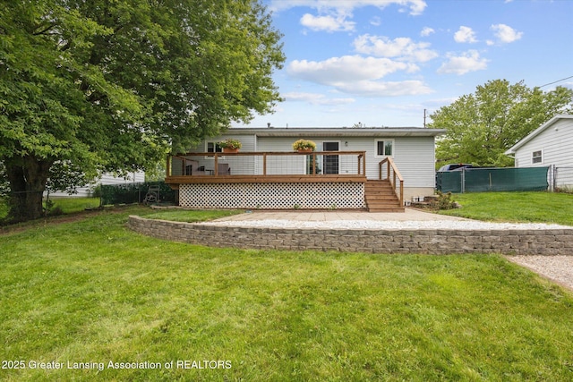530 S Dibble Blvd, Lansing, MI 48917 - rear view of house featuring a deck