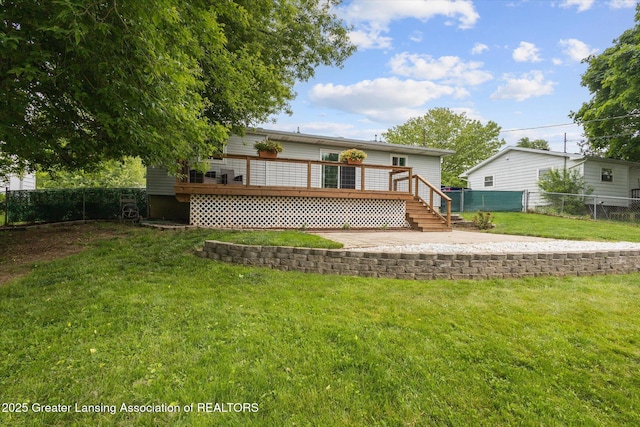 530 S Dibble Blvd, Lansing, MI 48917 - back of property featuring a wooden deck