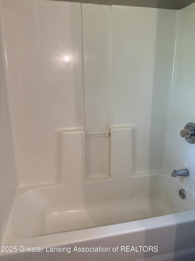 2113 S Rundle Ave, Lansing, MI 48910 - full bathroom featuring tub / shower combination