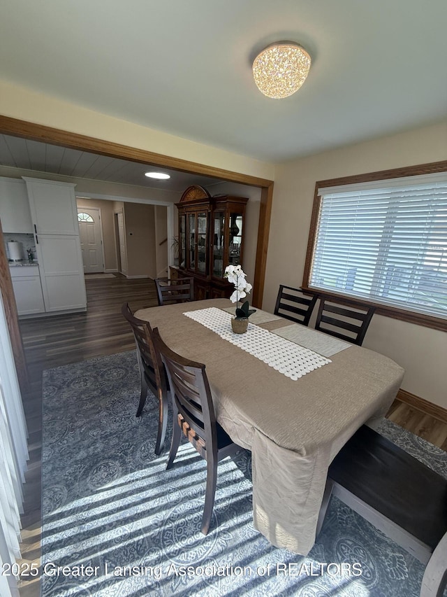 4412 Darron Dr, Lansing, MI 48917 - dining space with wood finished floors, plenty of natural light, and baseboards