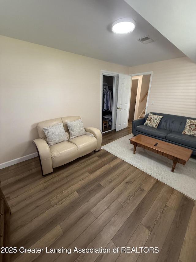 4412 Darron Dr, Lansing, MI 48917 - living area with wood finished floors and baseboards