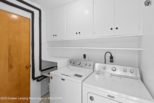 401 Julian Ave, Lansing, MI 48917 - washroom featuring cabinet space and washer and clothes dryer