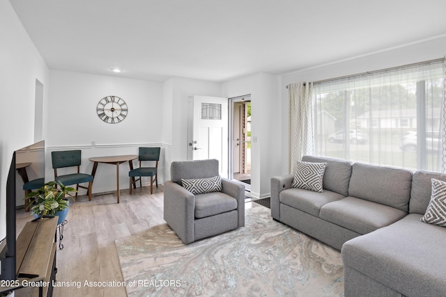 401 Julian Ave, Lansing, MI 48917 - living room featuring wood finished floors and recessed lighting