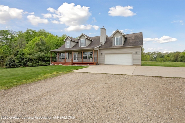 2424 S Canfield Rd, Eaton Rapids, MI 48827 - new england style home featuring driveway, a porch, a front yard, an attached garage, and a chimney