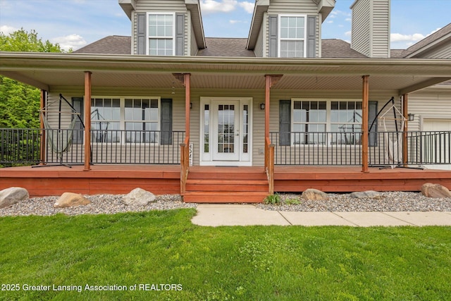 2424 S Canfield Rd, Eaton Rapids, MI 48827 - view of front of property featuring covered porch, roof with shingles, a front yard, and a chimney