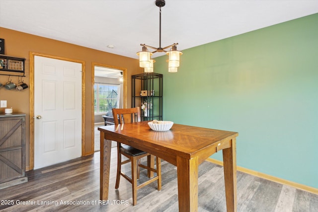 2424 S Canfield Rd, Eaton Rapids, MI 48827 - dining room with wood finished floors