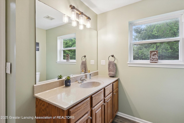 2424 S Canfield Rd, Eaton Rapids, MI 48827 - bathroom with vanity and toilet