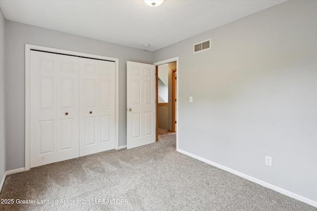 2424 S Canfield Rd, Eaton Rapids, MI 48827 - unfurnished bedroom with carpet floors and a closet