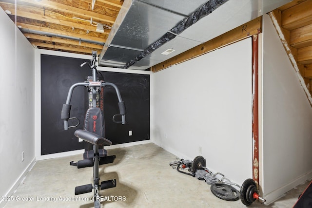 2424 S Canfield Rd, Eaton Rapids, MI 48827 - workout room featuring baseboards