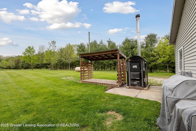 2424 S Canfield Rd, Eaton Rapids, MI 48827 - view of grassy yard featuring a storage unit