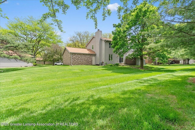 1010 Grenoble Cir, Lansing, MI 48917 - view of grassy yard