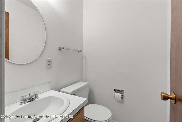 1010 Grenoble Cir, Lansing, MI 48917 - half bath with toilet and vanity