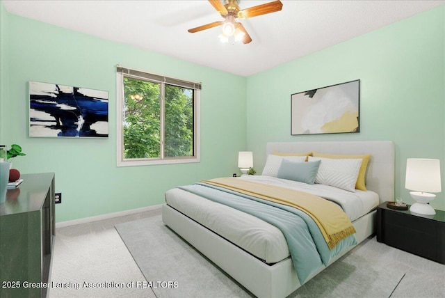 1010 Grenoble Cir, Lansing, MI 48917 - carpeted bedroom with baseboards and a ceiling fan