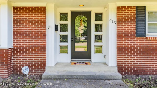 415 W Lawrence Ave, Charlotte, MI 48813 - entrance to property featuring brick siding