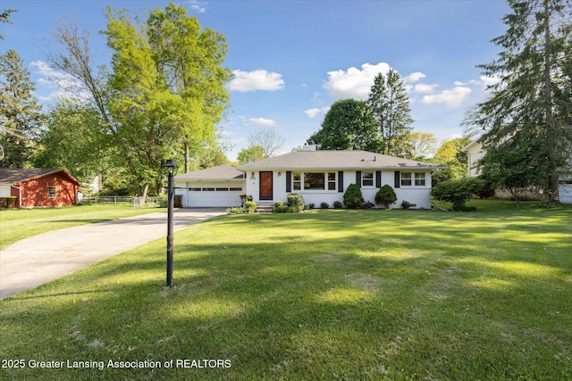 1571 Forest Hills Dr, Okemos, MI 48864 - ranch-style house with concrete driveway, a front yard, an attached garage, and a chimney