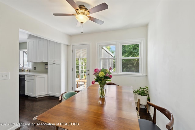 1571 Forest Hills Dr, Okemos, MI 48864 - dining room with healthy amount of natural light, dark wood-style flooring, and ceiling fan