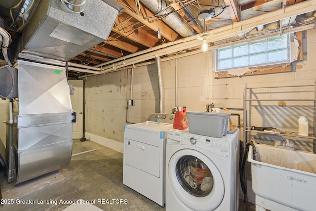 1571 Forest Hills Dr, Okemos, MI 48864 - laundry area with independent washer and dryer and heating unit