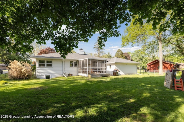 1571 Forest Hills Dr, Okemos, MI 48864 - back of house featuring a sunroom and a chimney