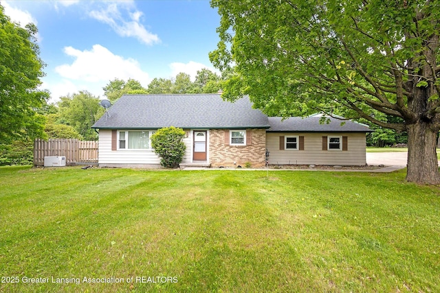 1116 W Service Rd, Mason, MI 48854 - view of front of house featuring roof with shingles