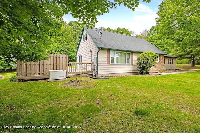 1116 W Service Rd, Mason, MI 48854 - view of side of home with a shingled roof