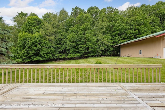 1116 W Service Rd, Mason, MI 48854 - wooden deck featuring a lawn