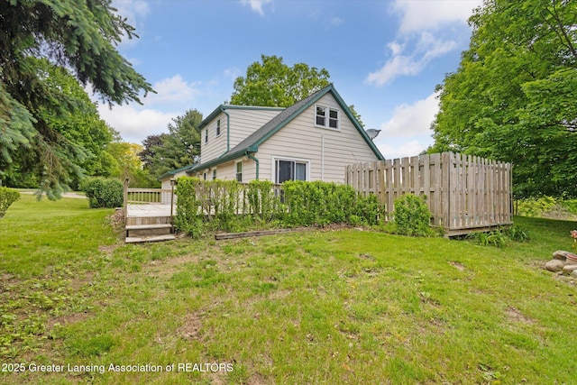 1116 W Service Rd, Mason, MI 48854 - view of property exterior featuring a wooden deck