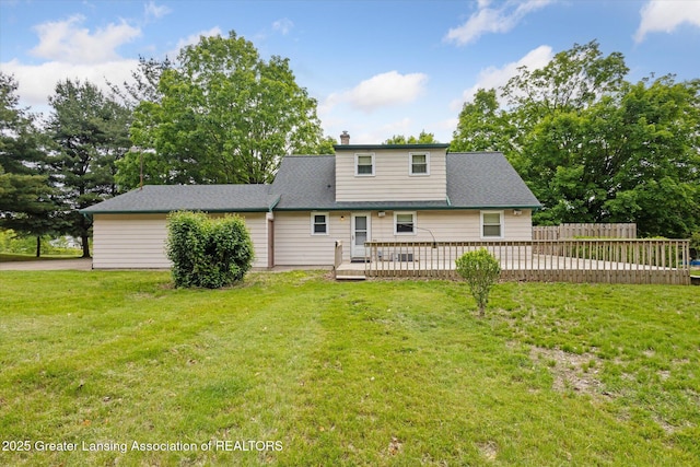 1116 W Service Rd, Mason, MI 48854 - rear view of house with a chimney and a deck