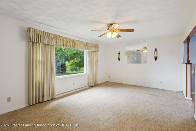 1116 W Service Rd, Mason, MI 48854 - carpeted empty room with ceiling fan and baseboards