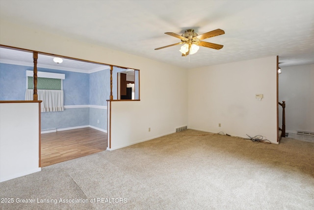 1116 W Service Rd, Mason, MI 48854 - carpeted spare room with ceiling fan and baseboards
