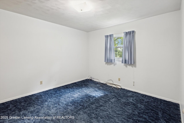 1116 W Service Rd, Mason, MI 48854 - carpeted spare room featuring baseboards