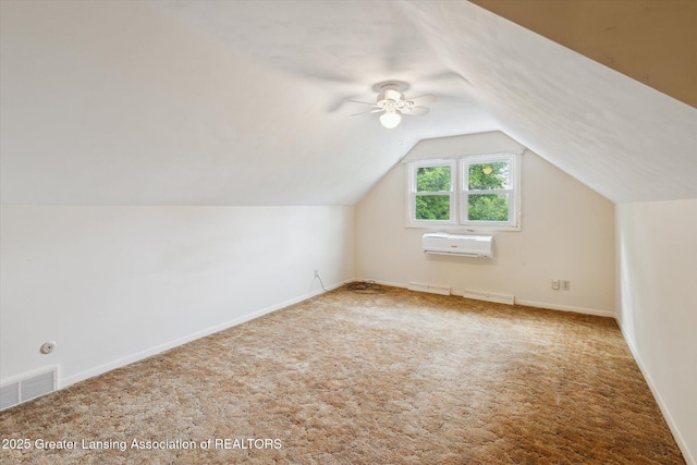 1116 W Service Rd, Mason, MI 48854 - bonus room with carpet floors, lofted ceiling, ceiling fan, and a wall mounted air conditioner