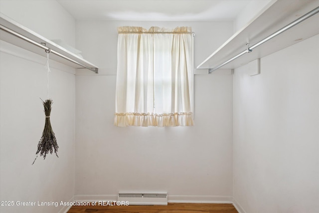 1116 W Service Rd, Mason, MI 48854 - spacious closet with wood finished floors
