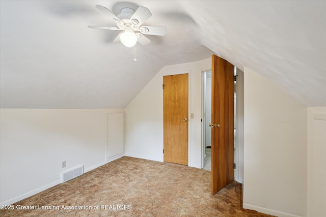 1116 W Service Rd, Mason, MI 48854 - bonus room featuring carpet flooring, lofted ceiling, a ceiling fan, and baseboards