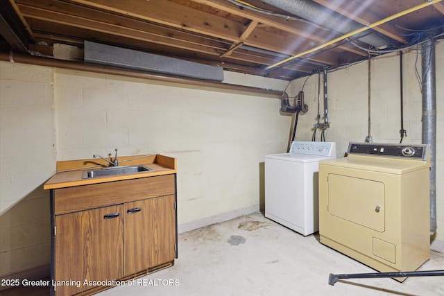 1116 W Service Rd, Mason, MI 48854 - laundry room with washing machine and dryer and cabinet space