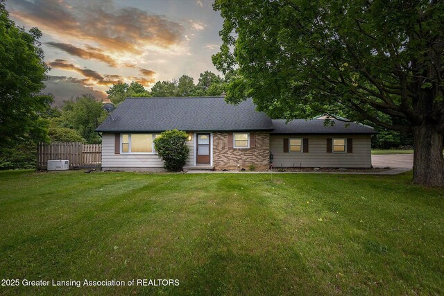 1116 W Service Rd, Mason, MI 48854 - view of front of home with roof with shingles