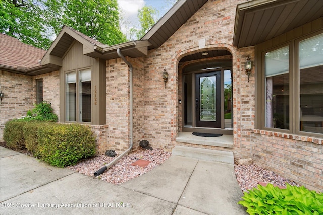 12728 Oneida Woods Trl, Grand Ledge, MI 48837 - property entrance featuring brick siding