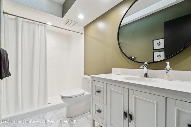 12728 Oneida Woods Trl, Grand Ledge, MI 48837 - full bath with vanity, toilet, a tile shower, recessed lighting, and marble finish floors