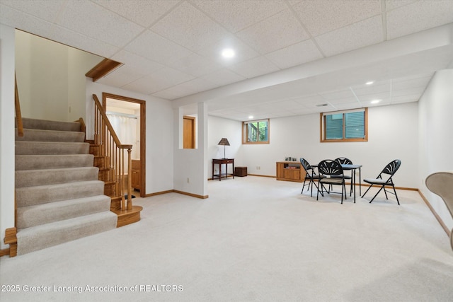 12728 Oneida Woods Trl, Grand Ledge, MI 48837 - sitting room with carpet floors, a paneled ceiling, stairway, baseboards, and recessed lighting