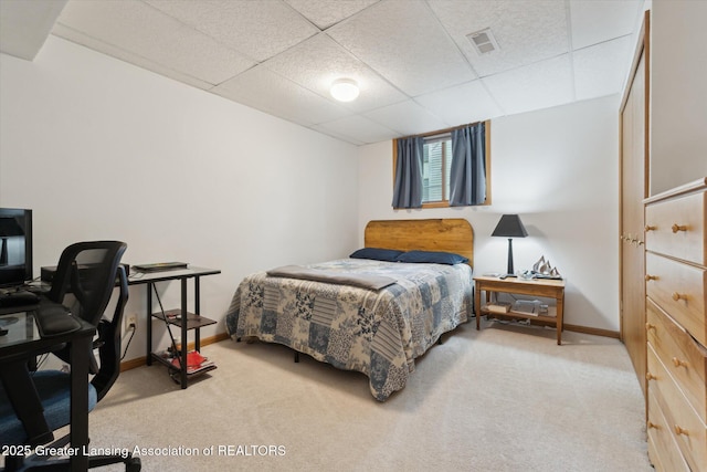 12728 Oneida Woods Trl, Grand Ledge, MI 48837 - bedroom with light carpet, baseboards, and a drop ceiling