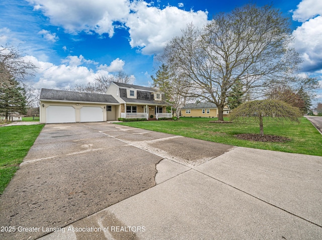 1932 Maple Shade Dr, Williamston, MI 48895 - view of front of property with a porch, asphalt driveway, an attached garage, a front lawn, and a shingled roof