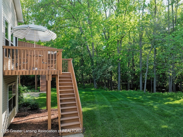 5167 Sapphire Cir, East Lansing, MI 48823 - view of green lawn with stairway and a deck