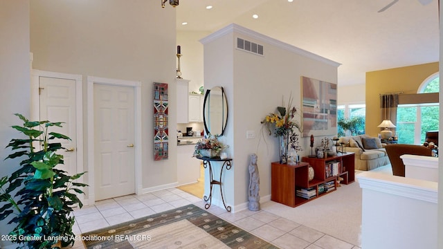 5167 Sapphire Cir, East Lansing, MI 48823 - entrance foyer with light tile patterned floors, recessed lighting, baseboards, and a high ceiling