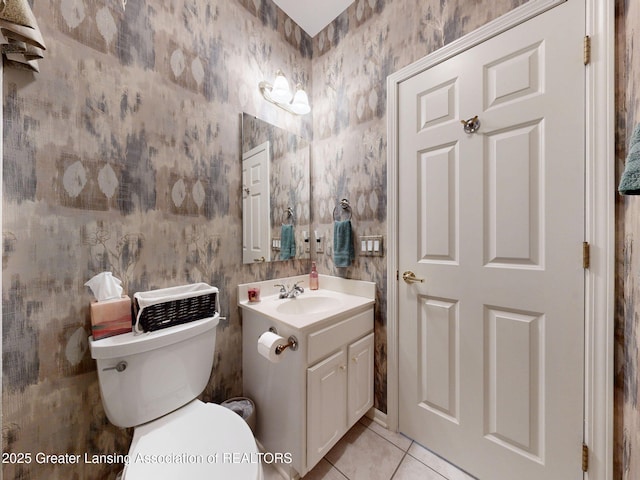 5167 Sapphire Cir, East Lansing, MI 48823 - half bathroom with tile patterned flooring, vanity, toilet, and wallpapered walls